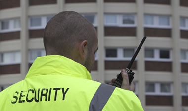 Security guard with two way radio